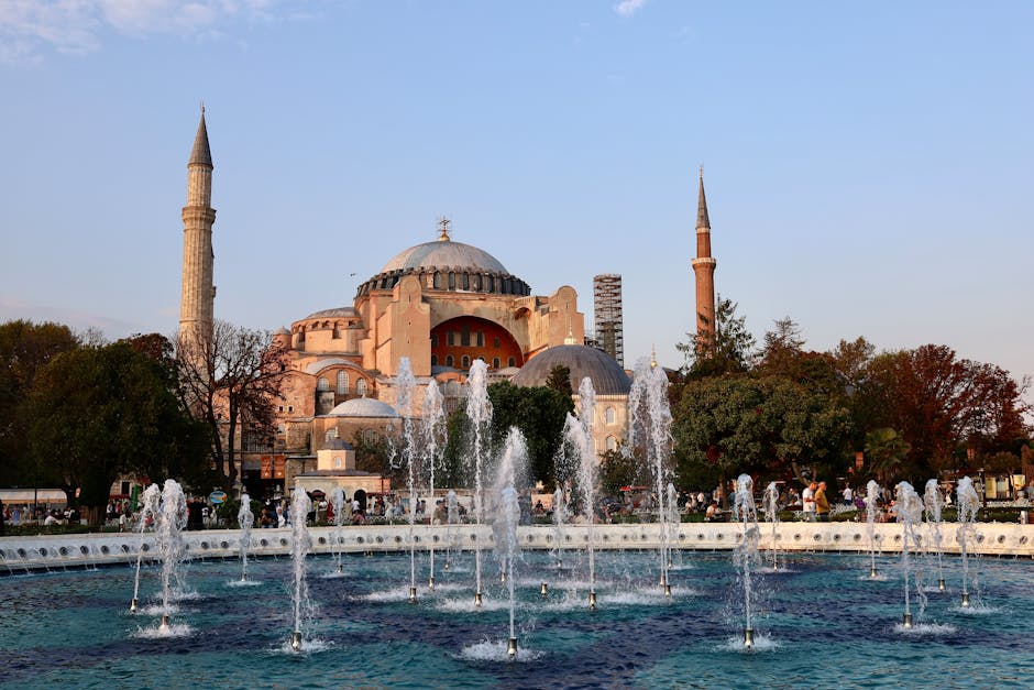Stunning view of Hagia Sophia with fountain at sunset in İstanbul, Türkiye.